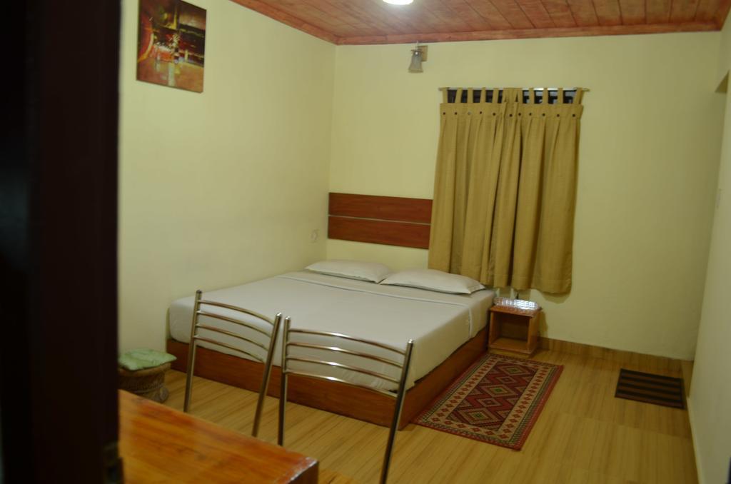 Hotel Rheinberg Town Haus à Munnar Chambre photo