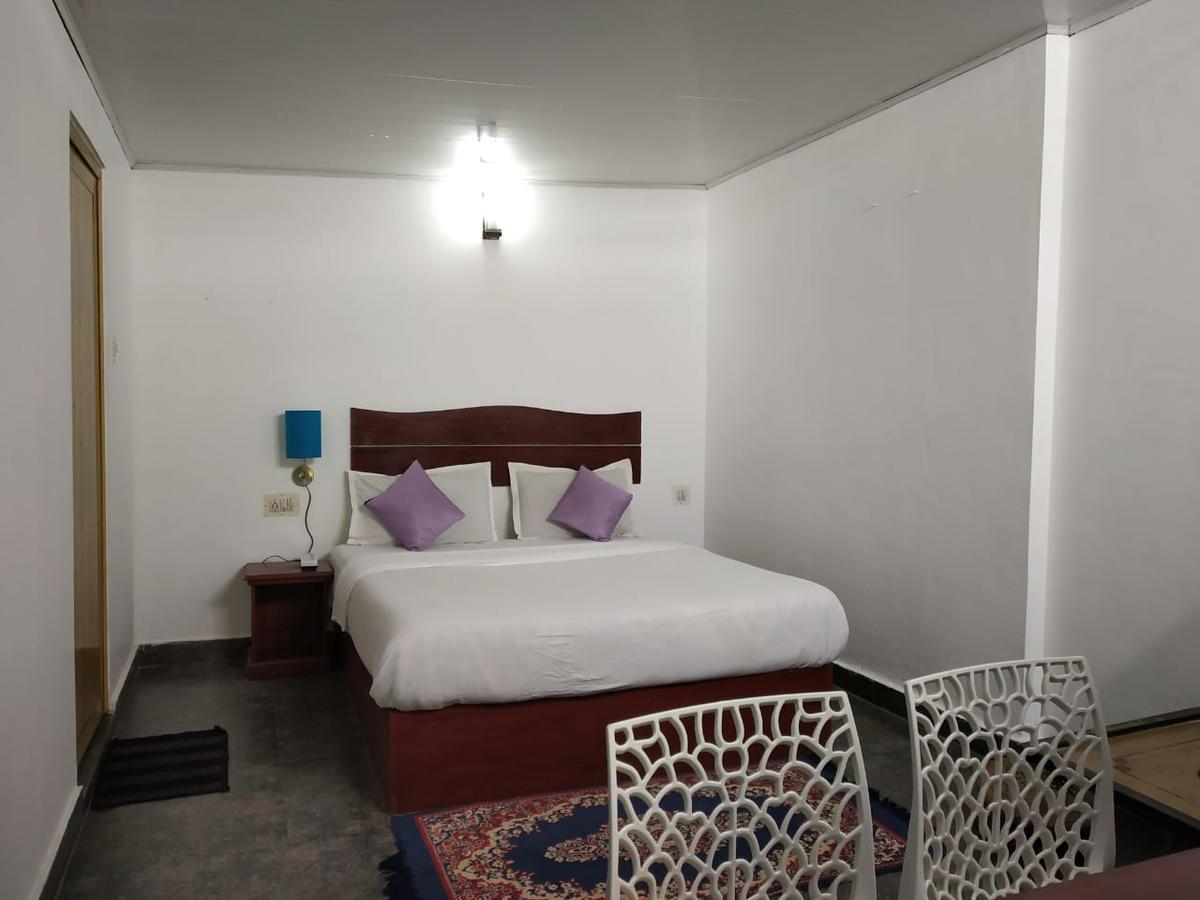 Hotel Rheinberg Town Haus à Munnar Extérieur photo