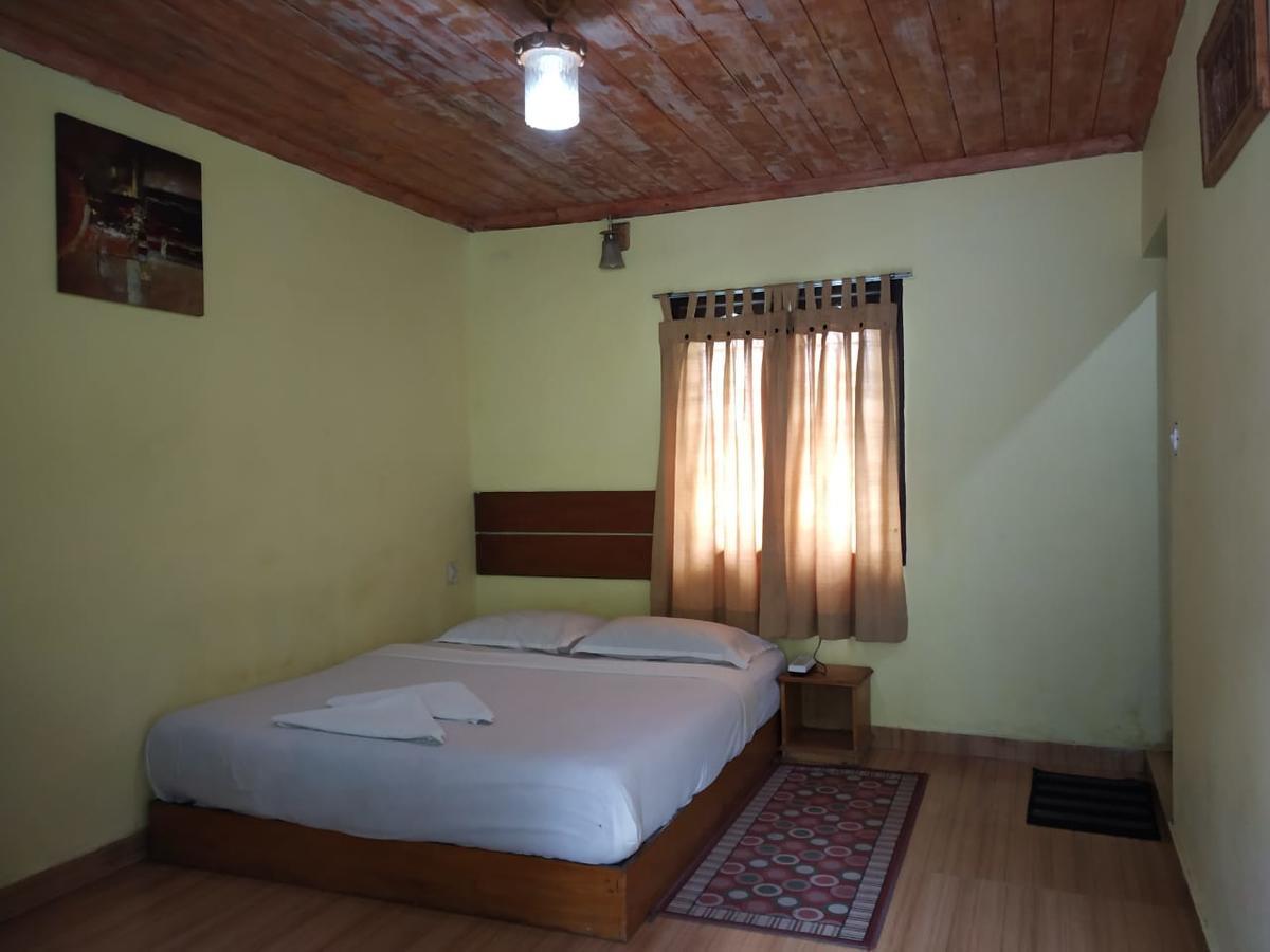 Hotel Rheinberg Town Haus à Munnar Extérieur photo